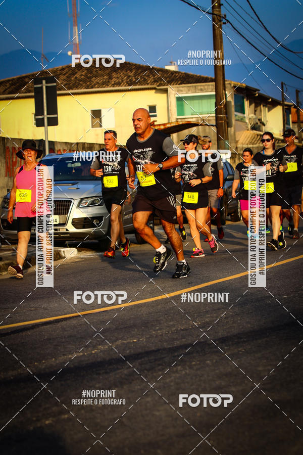 Buy your photos of the eventguia 13K Praia Grande on Fotop