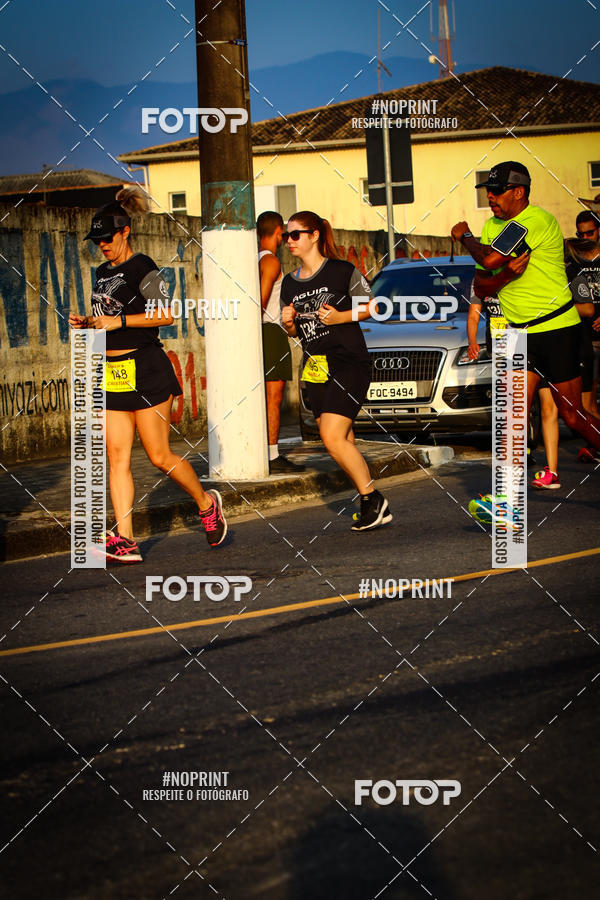 Buy your photos of the eventguia 13K Praia Grande on Fotop