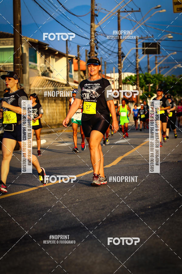 Buy your photos of the eventguia 13K Praia Grande on Fotop