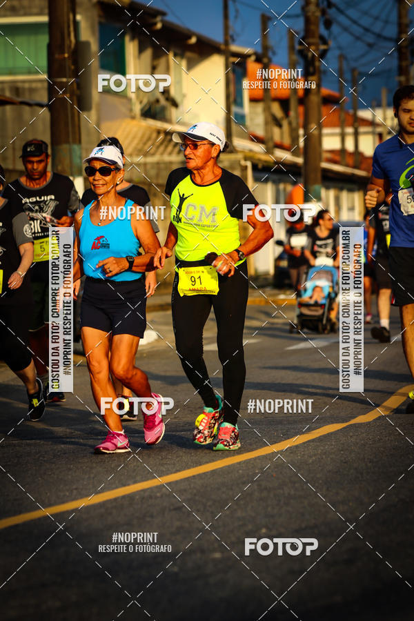 Buy your photos of the eventguia 13K Praia Grande on Fotop