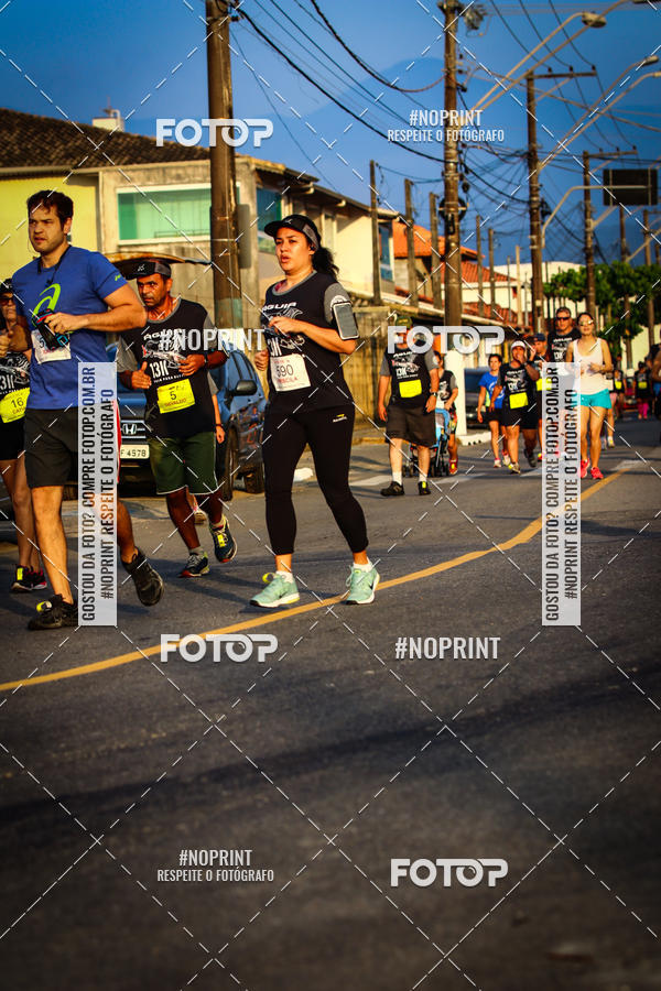 Buy your photos of the eventguia 13K Praia Grande on Fotop