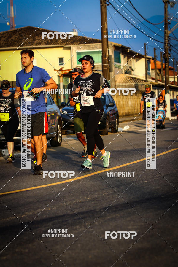 Buy your photos of the eventguia 13K Praia Grande on Fotop