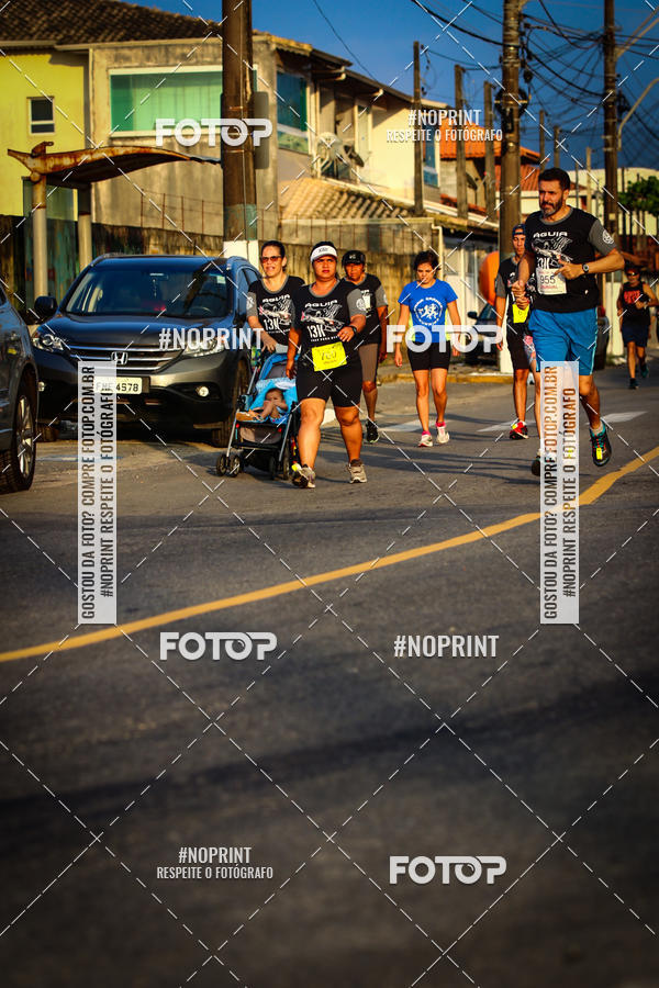 Buy your photos of the eventguia 13K Praia Grande on Fotop