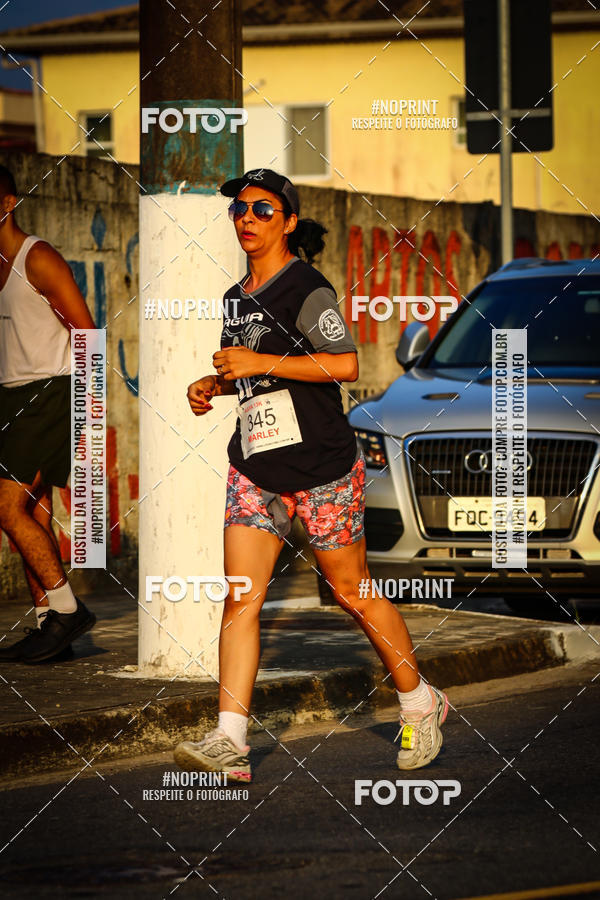 Buy your photos of the eventguia 13K Praia Grande on Fotop