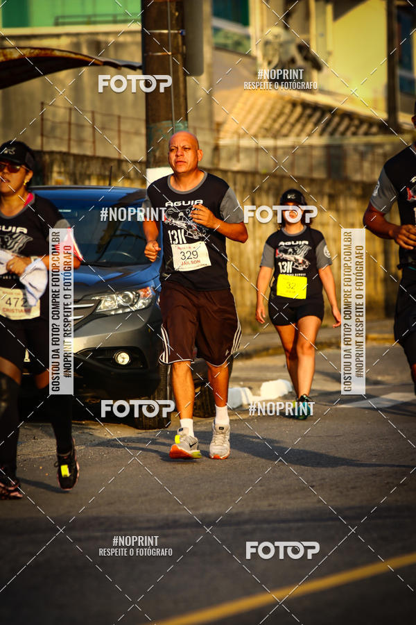 Buy your photos of the eventguia 13K Praia Grande on Fotop
