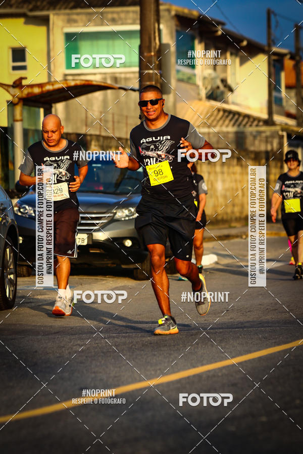 Buy your photos of the eventguia 13K Praia Grande on Fotop