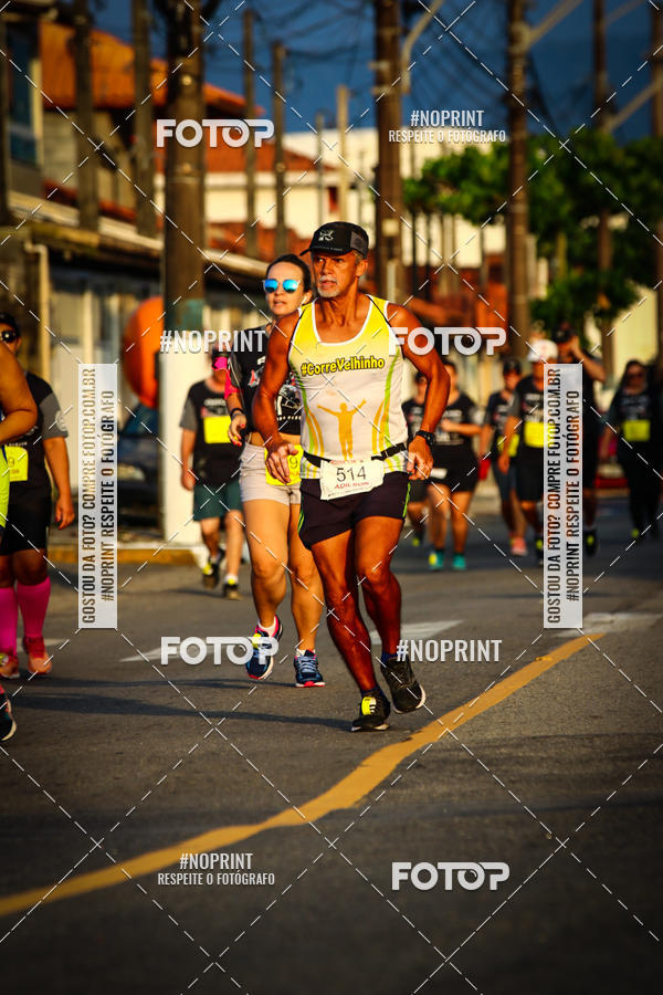 Buy your photos of the eventguia 13K Praia Grande on Fotop