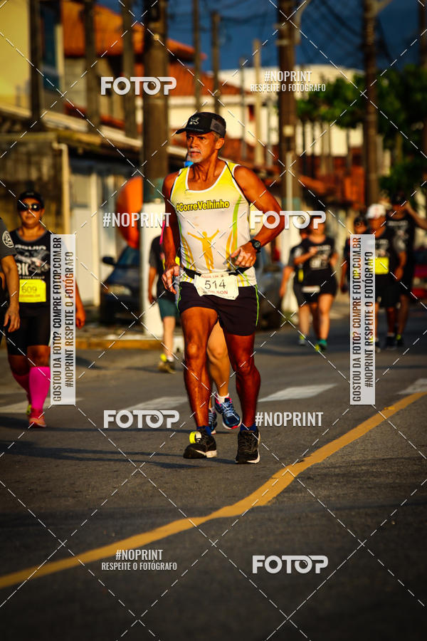 Buy your photos of the eventguia 13K Praia Grande on Fotop