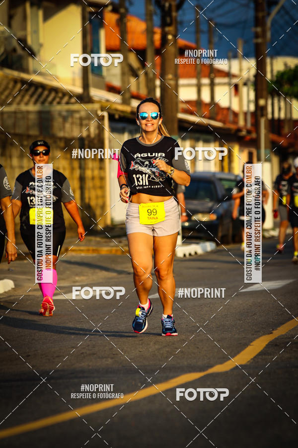 Buy your photos of the eventguia 13K Praia Grande on Fotop