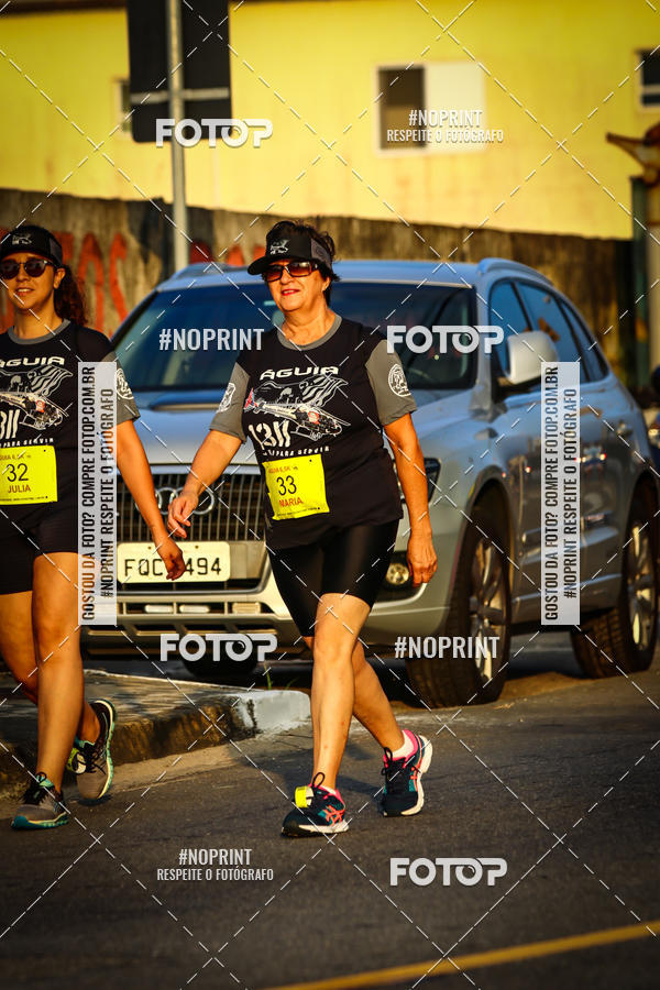 Buy your photos of the eventguia 13K Praia Grande on Fotop