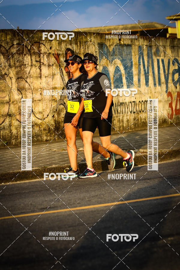 Buy your photos of the eventguia 13K Praia Grande on Fotop