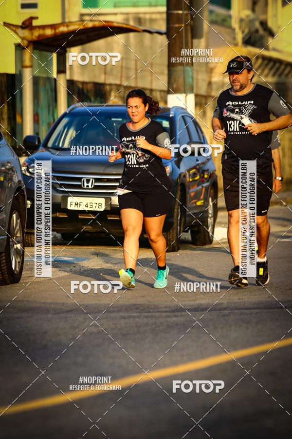 Buy your photos of the eventguia 13K Praia Grande on Fotop