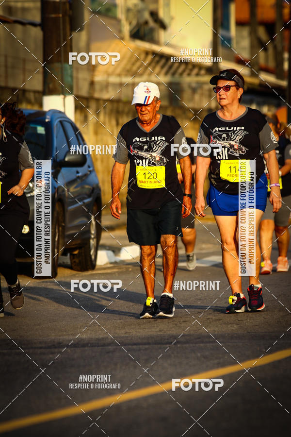 Buy your photos of the eventguia 13K Praia Grande on Fotop
