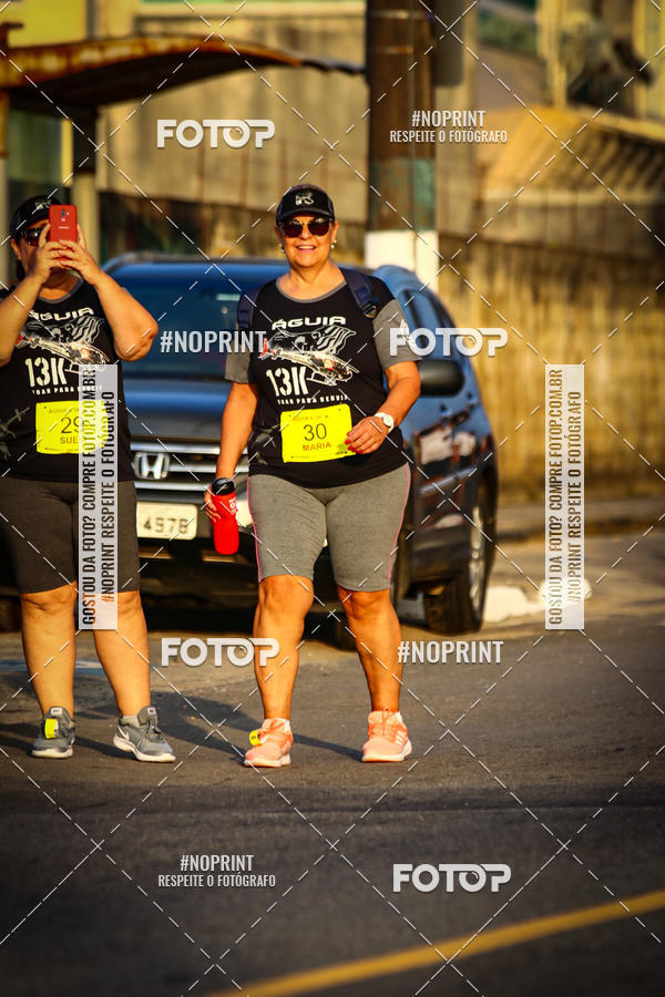 Buy your photos of the eventguia 13K Praia Grande on Fotop
