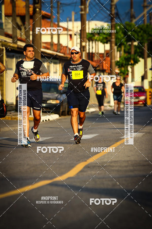 Buy your photos of the eventguia 13K Praia Grande on Fotop