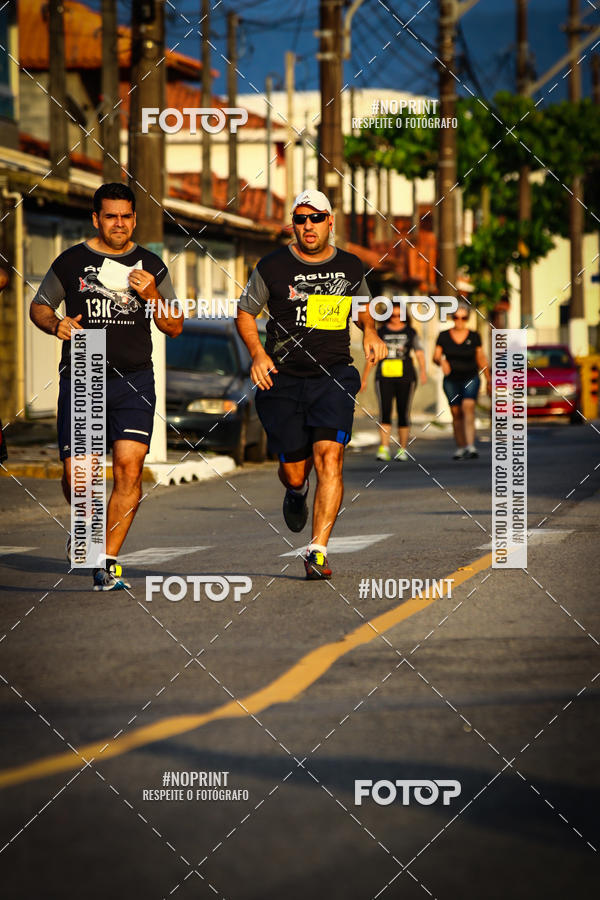 Buy your photos of the eventguia 13K Praia Grande on Fotop
