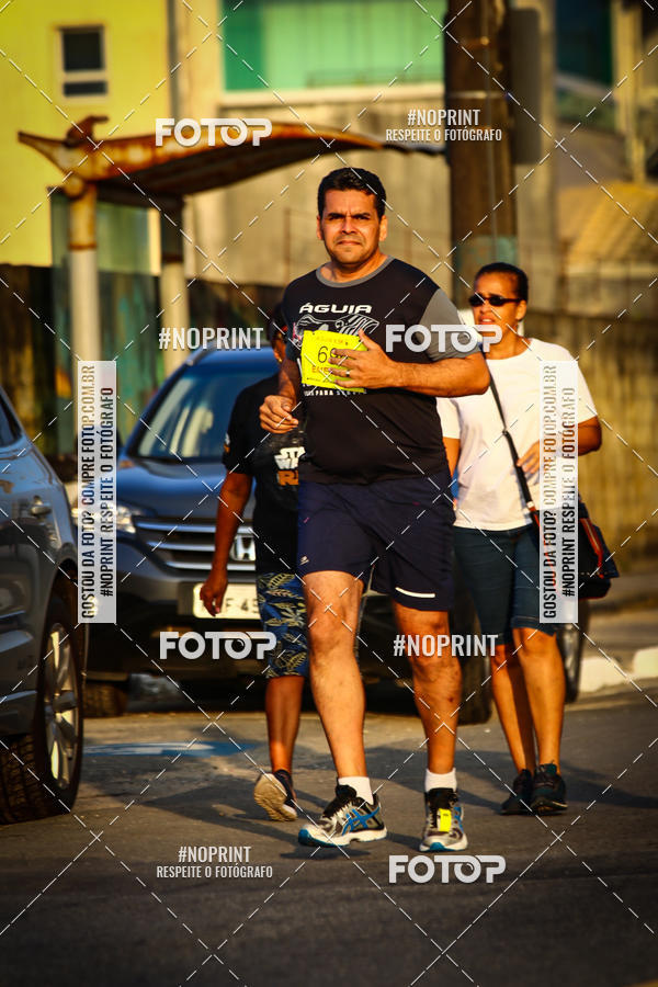 Buy your photos of the eventguia 13K Praia Grande on Fotop