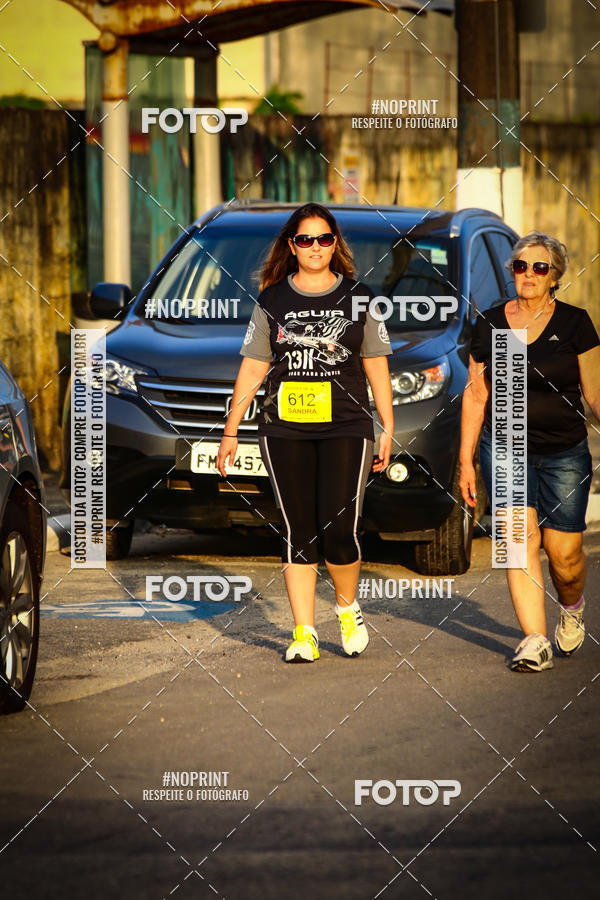 Buy your photos of the eventguia 13K Praia Grande on Fotop