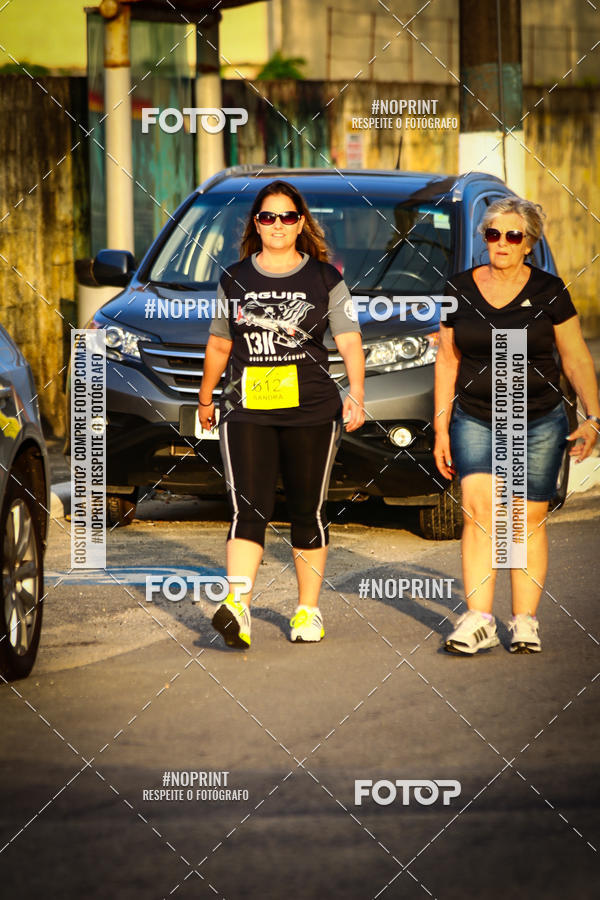 Buy your photos of the eventguia 13K Praia Grande on Fotop