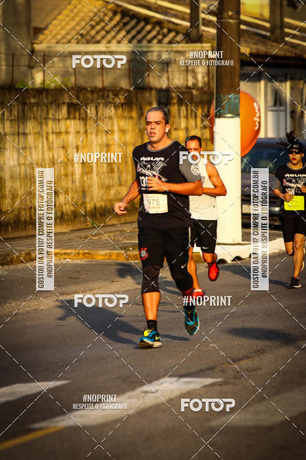 Buy your photos of the eventguia 13K Praia Grande on Fotop