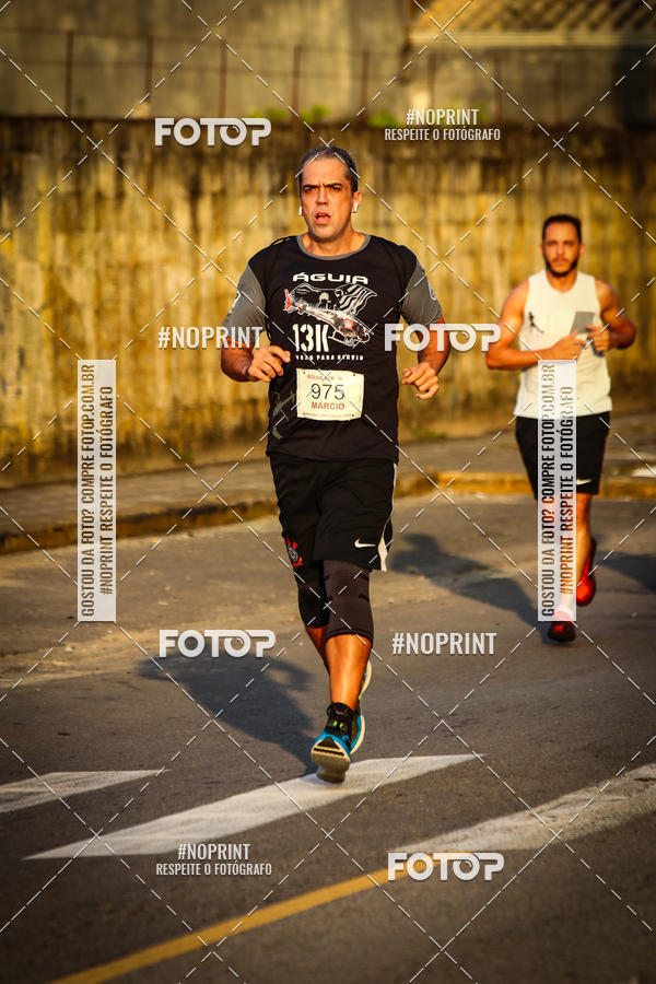 Buy your photos of the eventguia 13K Praia Grande on Fotop