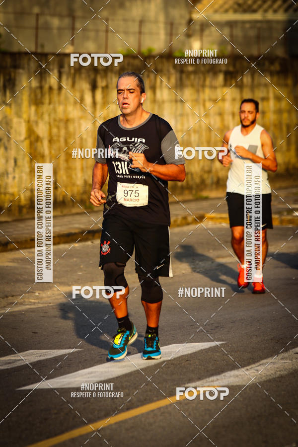 Buy your photos of the eventguia 13K Praia Grande on Fotop