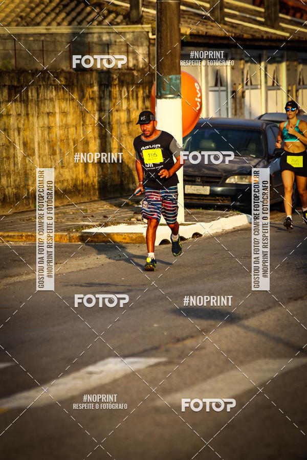 Buy your photos of the eventguia 13K Praia Grande on Fotop