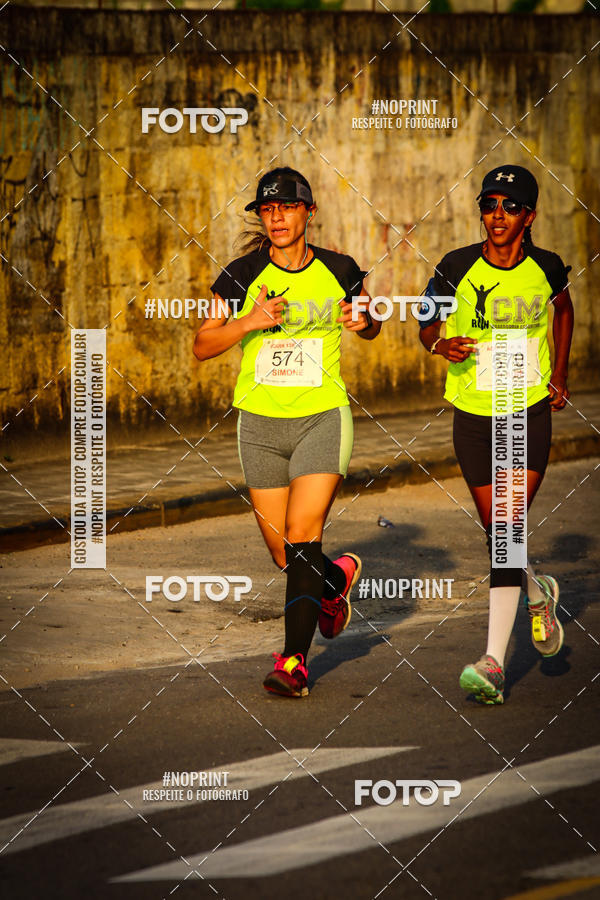 Buy your photos of the eventguia 13K Praia Grande on Fotop