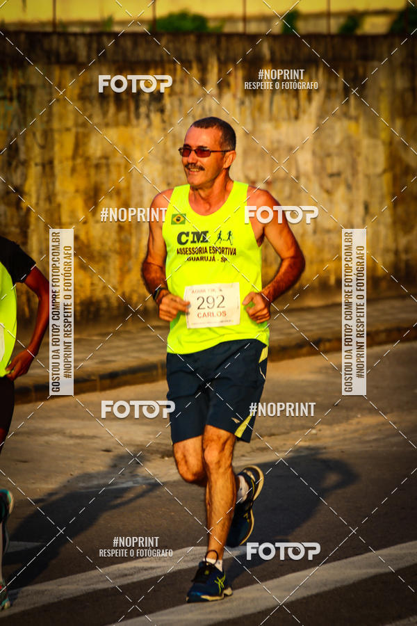 Buy your photos of the eventguia 13K Praia Grande on Fotop