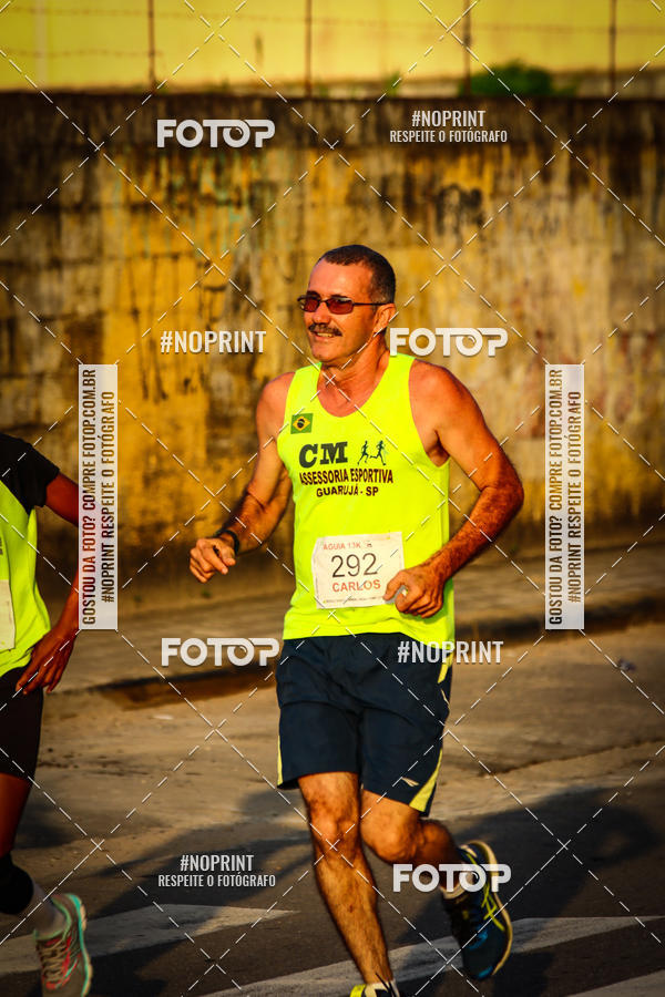 Buy your photos of the eventguia 13K Praia Grande on Fotop