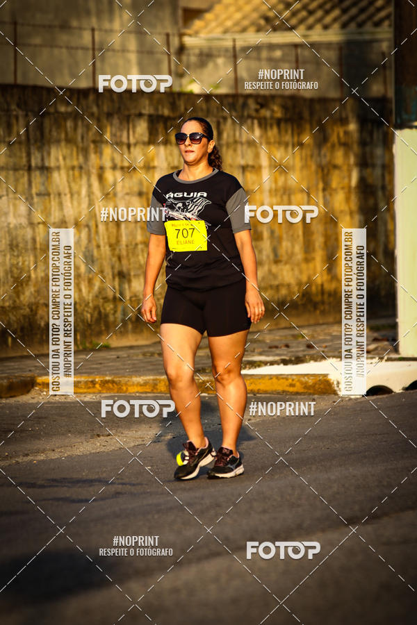 Buy your photos of the eventguia 13K Praia Grande on Fotop