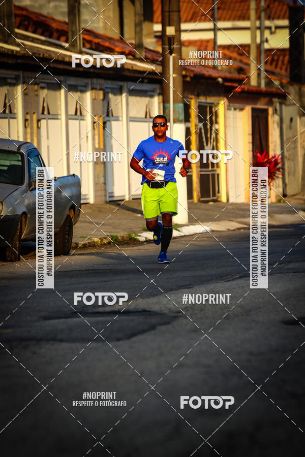 Buy your photos of the eventguia 13K Praia Grande on Fotop