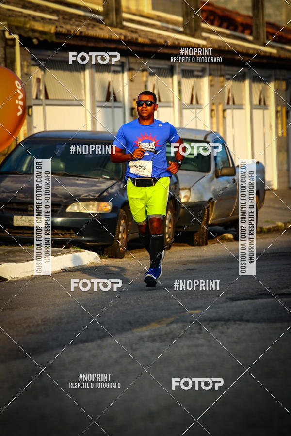 Buy your photos of the eventguia 13K Praia Grande on Fotop
