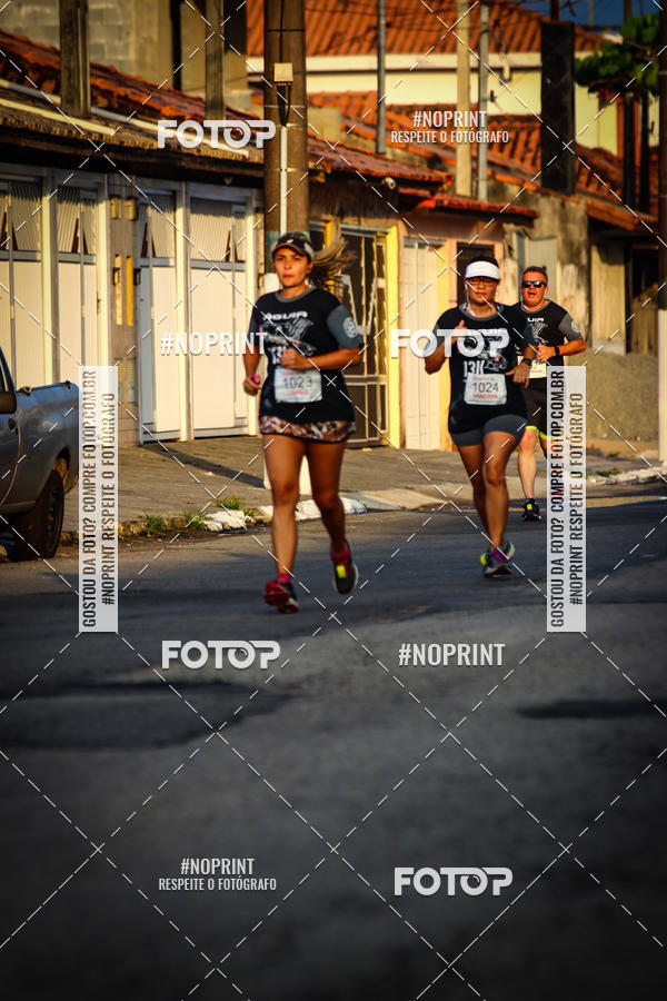 Buy your photos of the eventguia 13K Praia Grande on Fotop