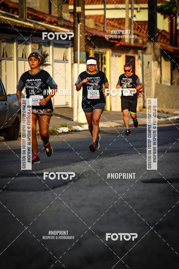 Buy your photos of the eventguia 13K Praia Grande on Fotop