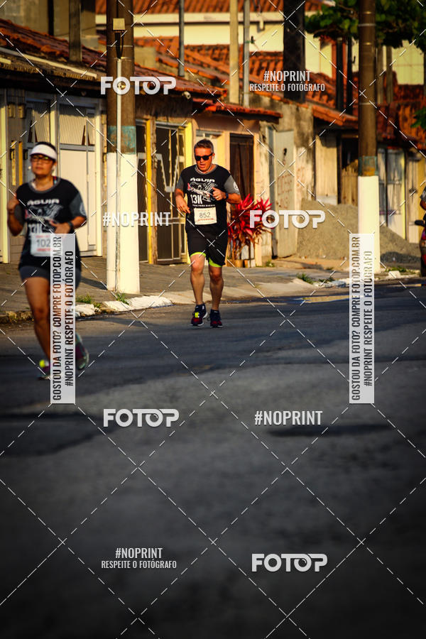 Buy your photos of the eventguia 13K Praia Grande on Fotop