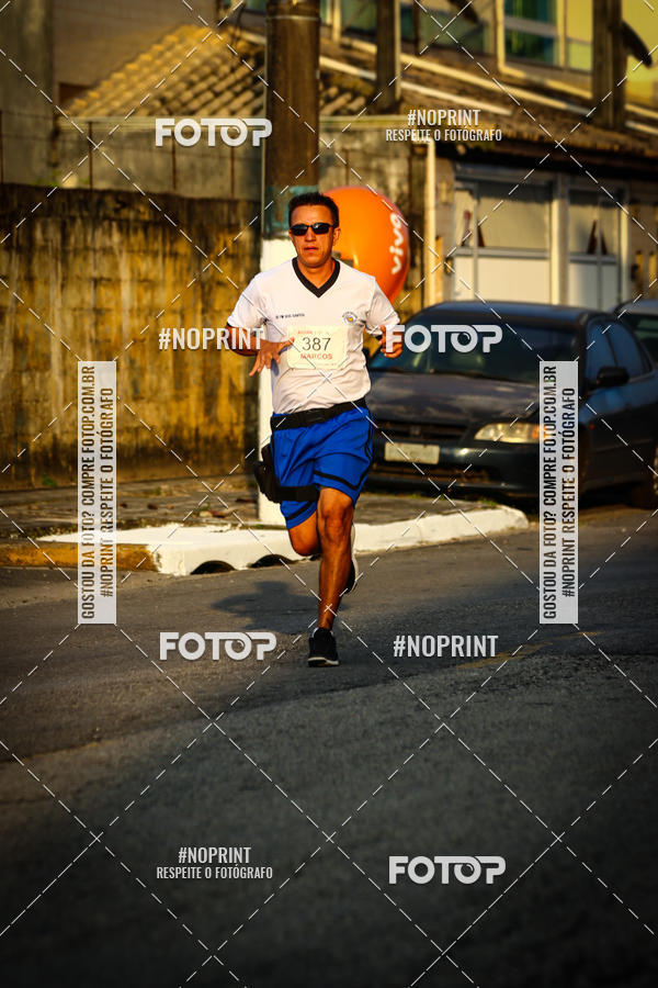 Buy your photos of the eventguia 13K Praia Grande on Fotop