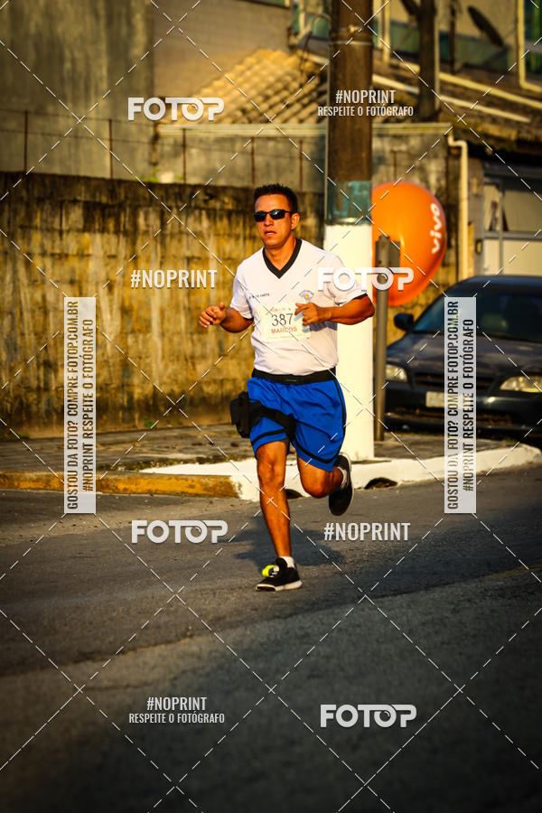 Buy your photos of the eventguia 13K Praia Grande on Fotop