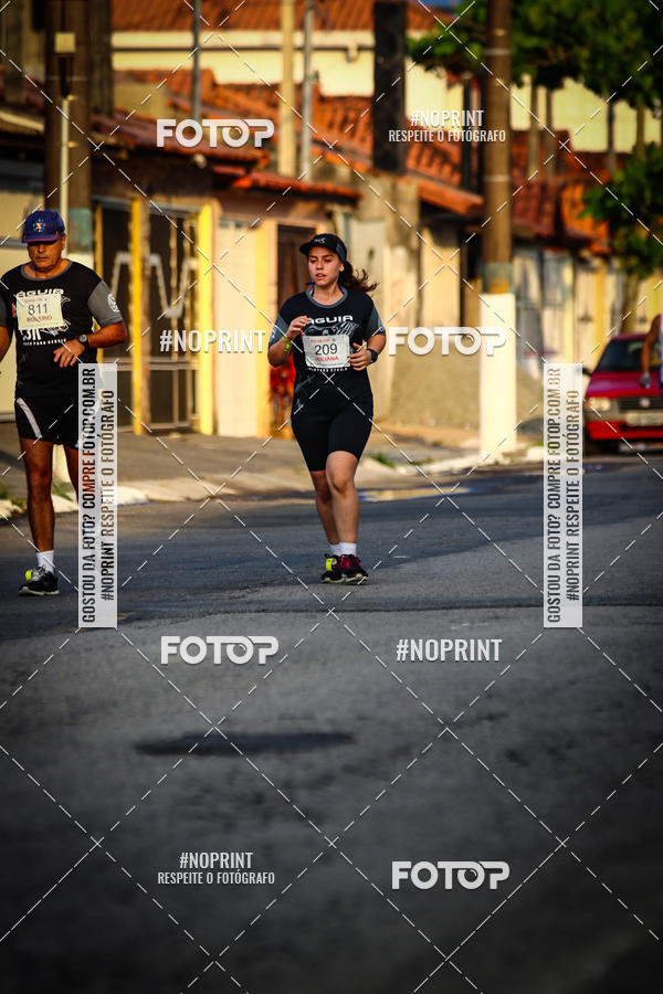 Buy your photos of the eventguia 13K Praia Grande on Fotop