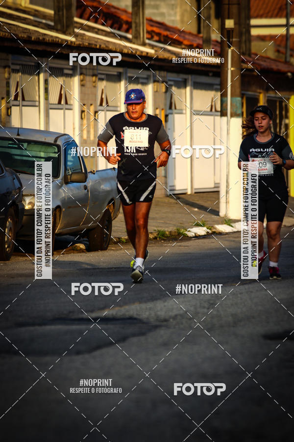 Buy your photos of the eventguia 13K Praia Grande on Fotop