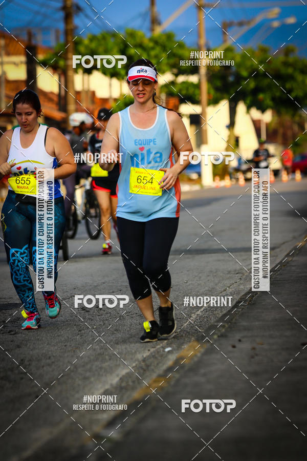 Buy your photos of the eventguia 13K Praia Grande on Fotop