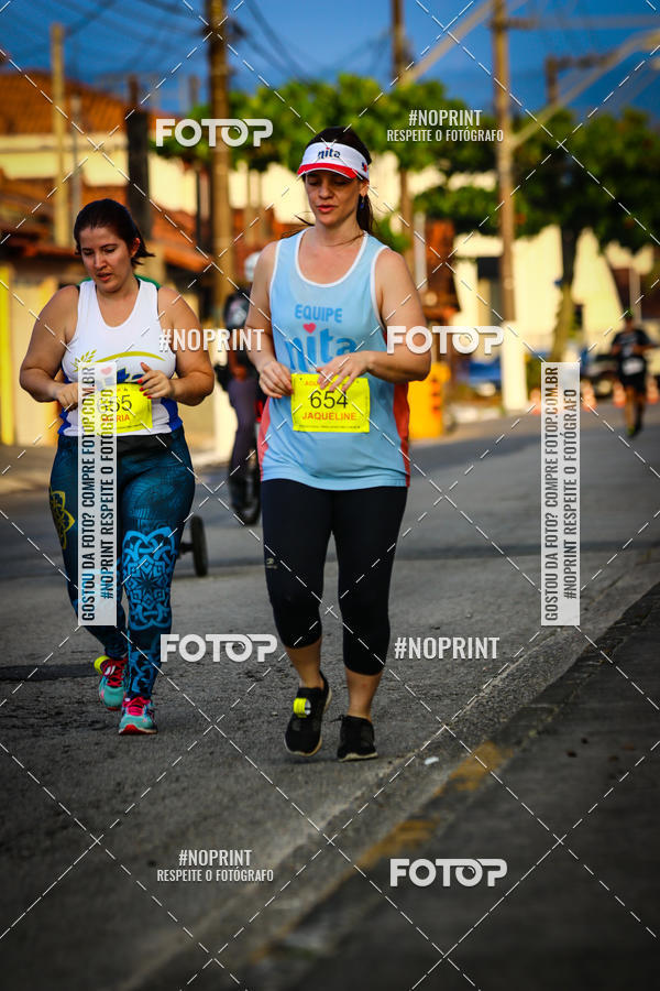 Buy your photos of the eventguia 13K Praia Grande on Fotop