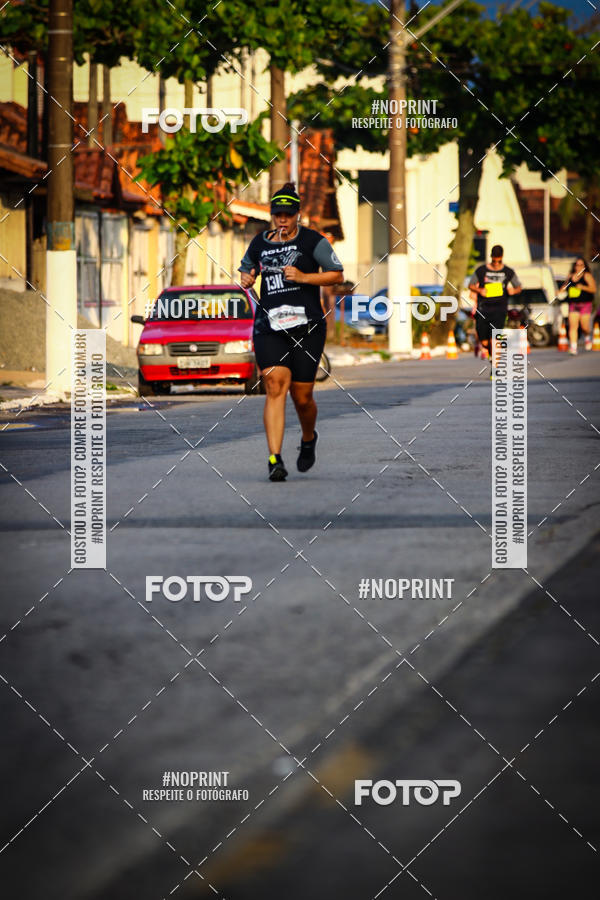 Buy your photos of the eventguia 13K Praia Grande on Fotop