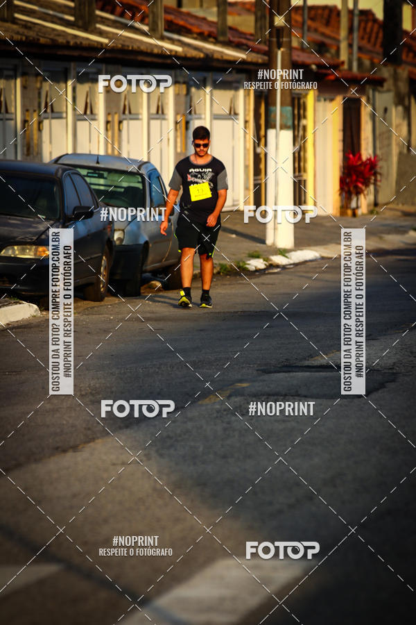 Buy your photos of the eventguia 13K Praia Grande on Fotop