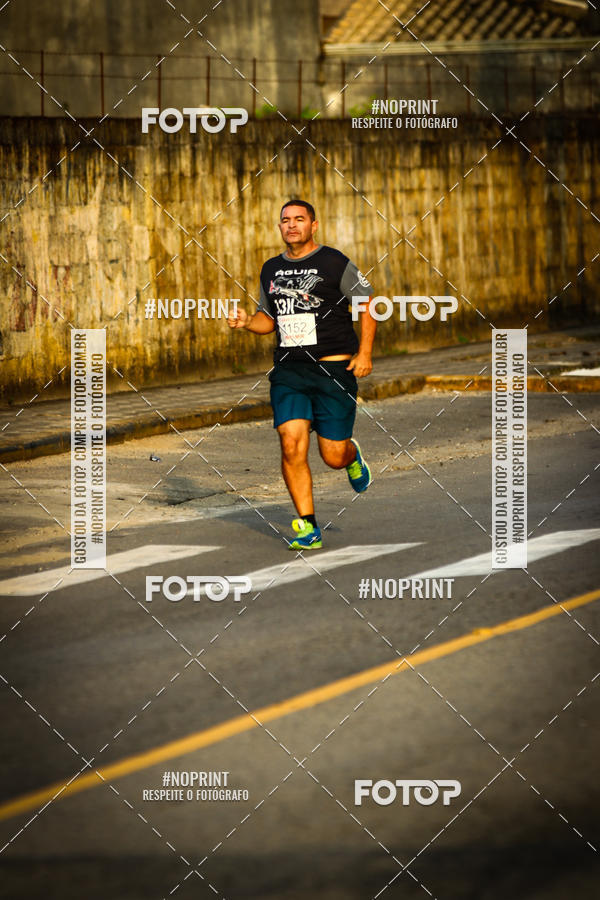 Buy your photos of the eventguia 13K Praia Grande on Fotop