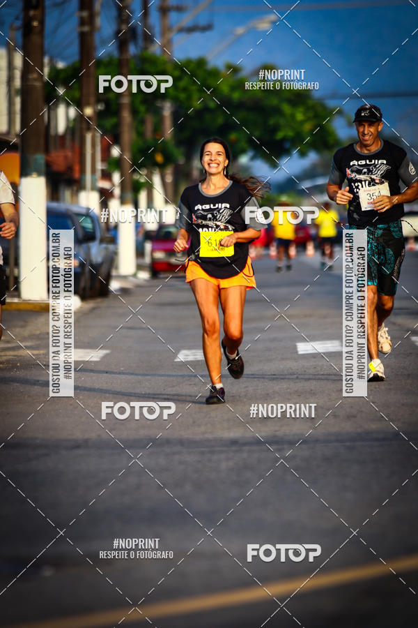 Buy your photos of the eventguia 13K Praia Grande on Fotop