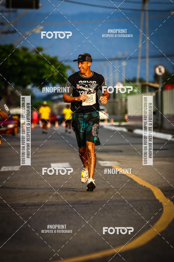 Buy your photos of the eventguia 13K Praia Grande on Fotop