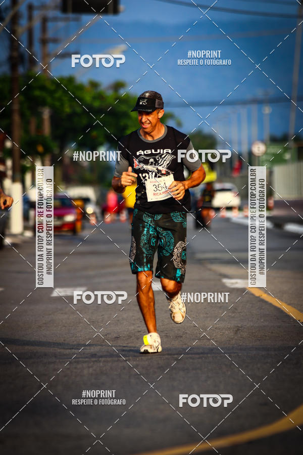 Buy your photos of the eventguia 13K Praia Grande on Fotop