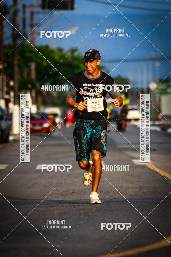 Buy your photos of the eventguia 13K Praia Grande on Fotop