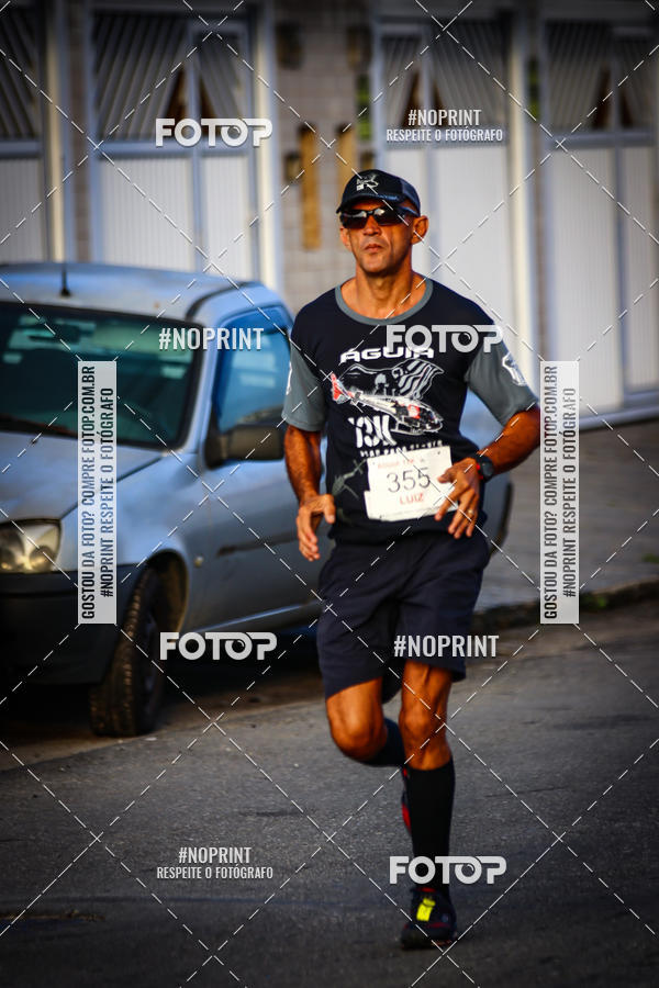 Buy your photos of the eventguia 13K Praia Grande on Fotop